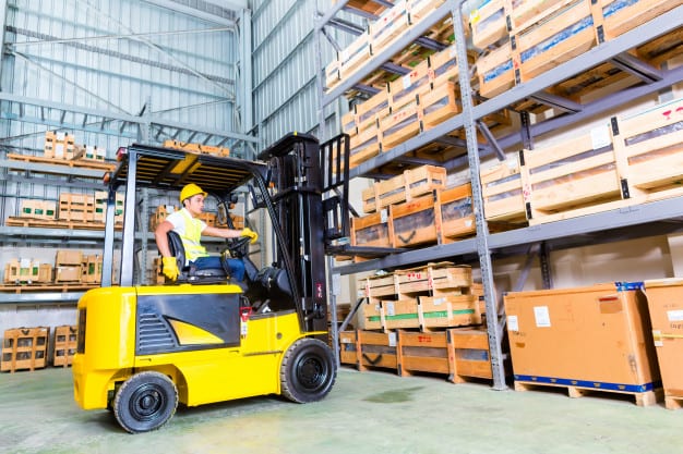 asian fork lift truck driver lifting pallet storage 79405 4045