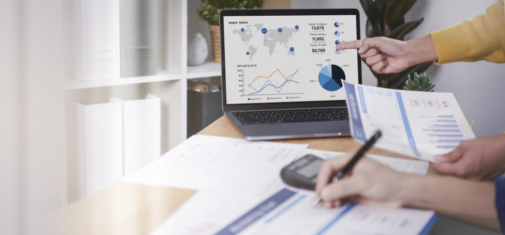 businesspeople meeting plan analysis graph company finance strat scaled 1